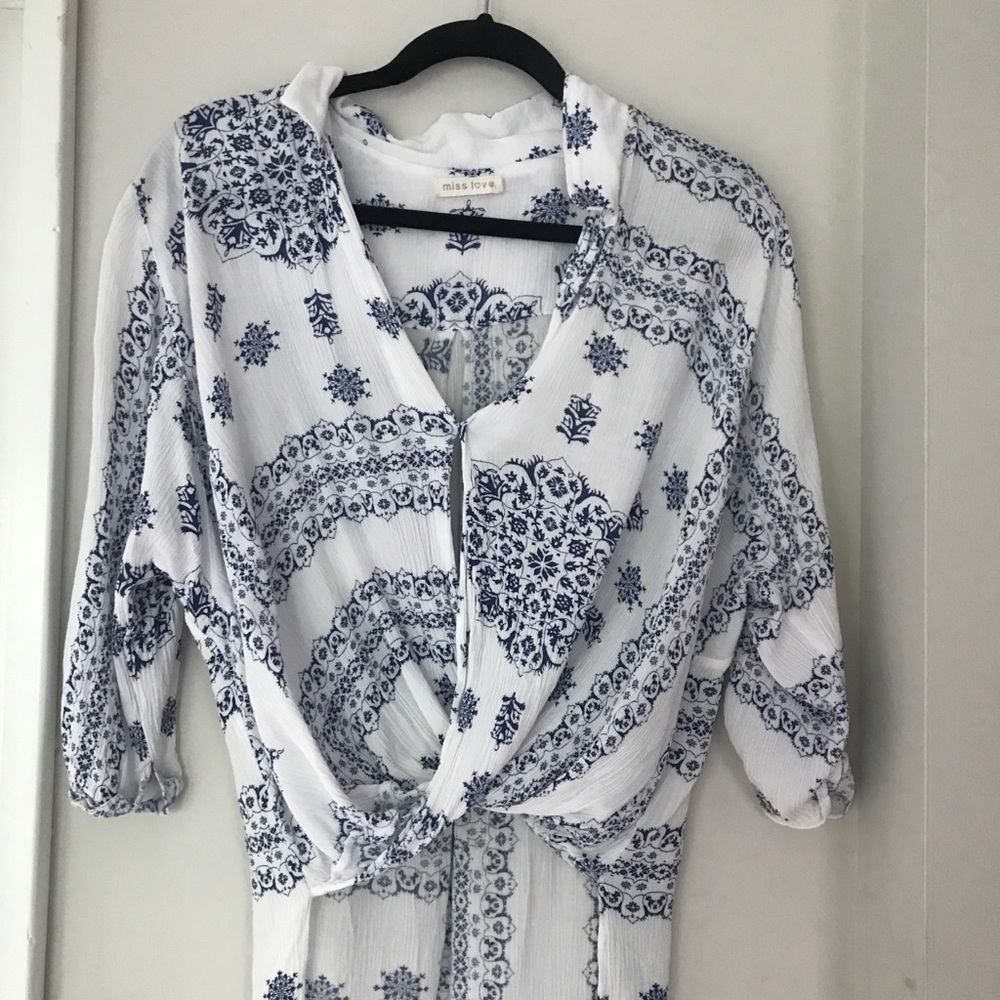 Blouse with cross over opening